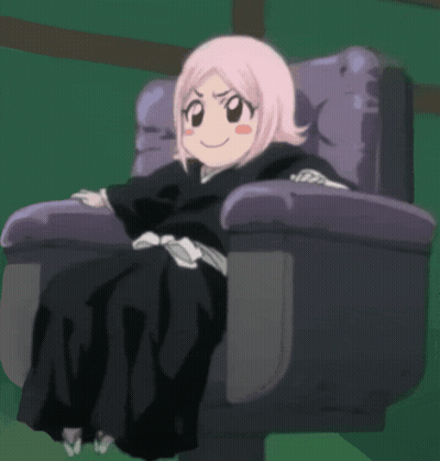 A Girl With Pink Hair Is Sitting In A Purple Chair GIF