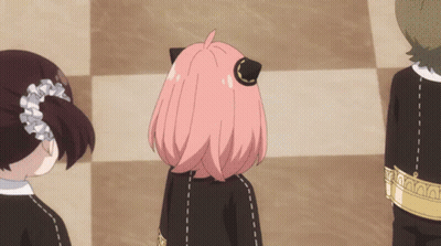 A Girl With Pink Hair Is Wearing A Black Outfit GIF