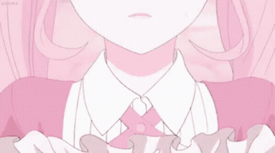 A Girl With Pink Hair Is Wearing A Pink Dress And A White Shirt . GIF