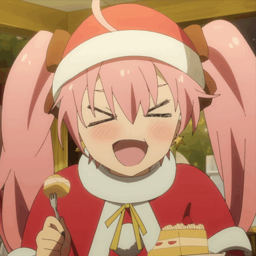 A Girl With Pink Hair Is Wearing A Santa Hat GIF