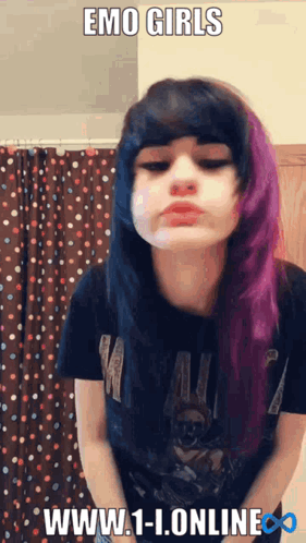 A Girl With Purple And Black Hair Is Wearing A Black Shirt GIF