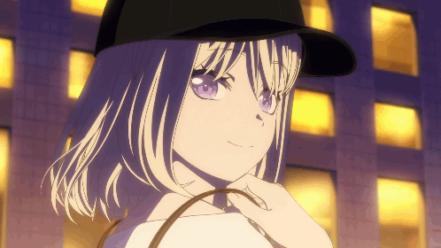 A Girl With Purple Eyes Wearing A Baseball Cap GIF