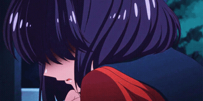 A Girl With Purple Hair Is Hugging Another Girl In A Red Shirt GIF