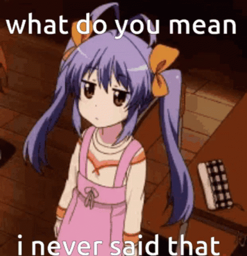 A Girl With Purple Hair Is Standing In Front Of A Table With The Words What Do You Mean I Never Said That GIF