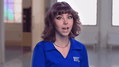 A Girl With Purple Hair Is Wearing A Blue Shirt That Says Best Buy GIF