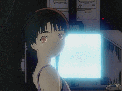 A Girl With Red Eyes Is Standing In Front Of A Computer GIF