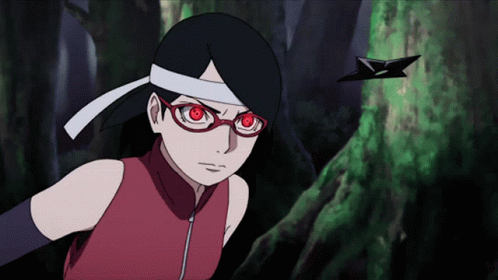A Girl With Red Eyes Is Wearing Glasses And A Bandana Around Her Head GIF