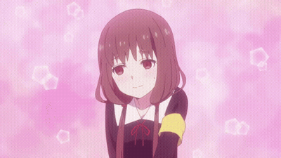 A Girl With Red Hair And A Yellow Arm Band Is Surrounded By Pink Bubbles GIF