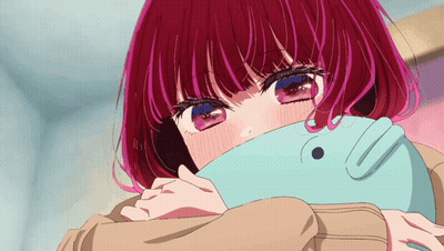 A Girl With Red Hair And Blue Eyes Is Covering Her Face With A Blanket GIF