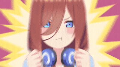 A Girl With Red Hair And Blue Eyes Is Wearing Blue Headphones GIF