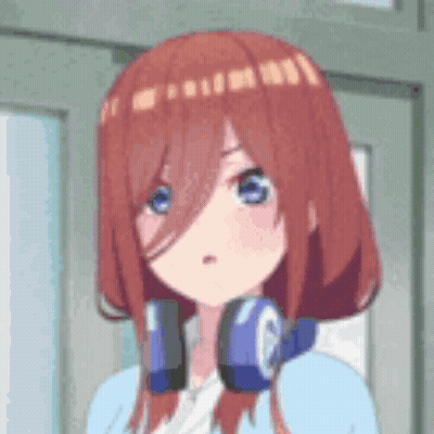 A Girl With Red Hair And Blue Eyes Wearing Headphones . GIF