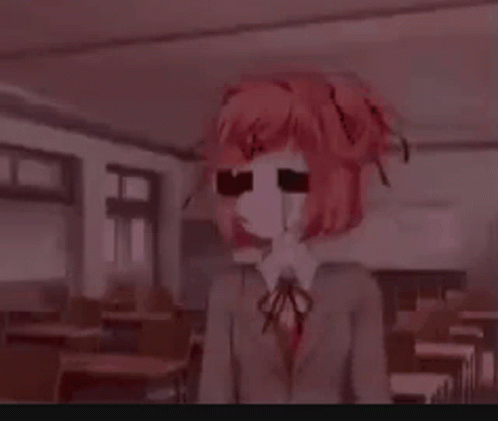 A Girl With Red Hair And Glasses Is Standing In A Classroom With A Bloody Face . GIF