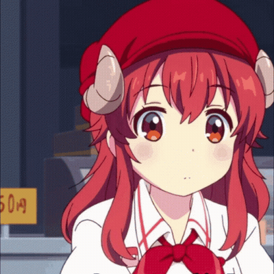 A Girl With Red Hair And Horns Is Standing In Front Of A Sign That Says 5.99 GIF