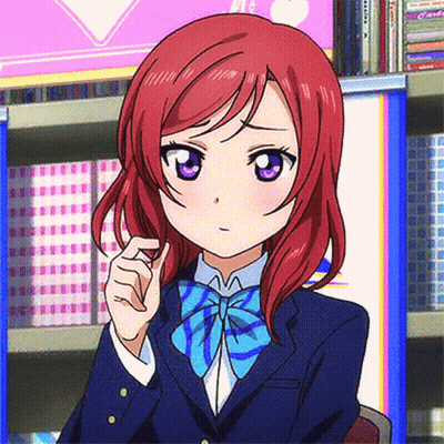 A Girl With Red Hair And Purple Eyes Is Wearing A Bow Tie GIF