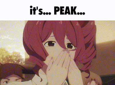 A Girl With Red Hair Covering Her Face With Her Hands And The Words It 'S Peak GIF