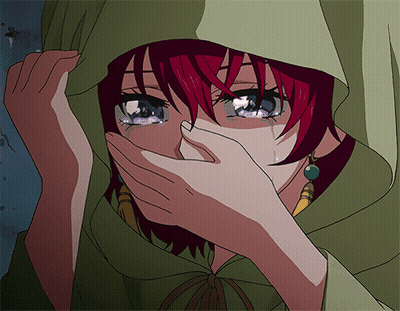 A Girl With Red Hair Is Covering Her Mouth With Her Hand GIF