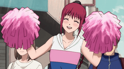 A Girl With Red Hair Is Holding Pink Pom Poms GIF