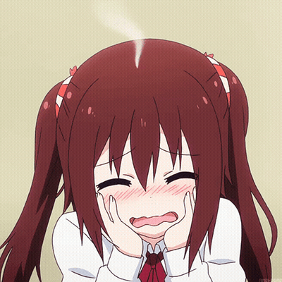 A Girl With Red Hair Is Making A Face With Her Hands On Her Face GIF