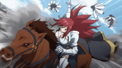 A Girl With Red Hair Is Riding A Horse GIF