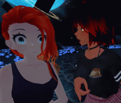 A Girl With Red Hair Is Standing Next To Another Girl With Black Hair GIF