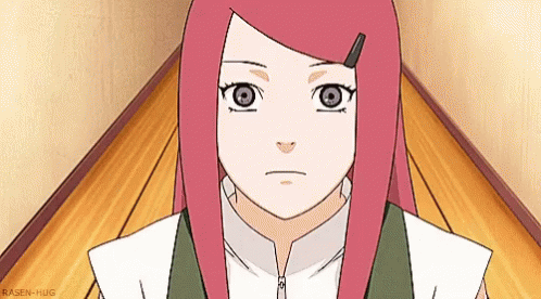 A Girl With Red Hair Is Standing On A Wooden Floor In A Room . GIF
