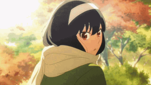 A Girl With Short Black Hair And Red Eyes Is Wearing A Scarf Around Her Neck And Head . GIF