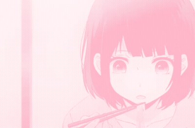 A Girl With Short Pink Hair Is Eating With Chopsticks GIF
