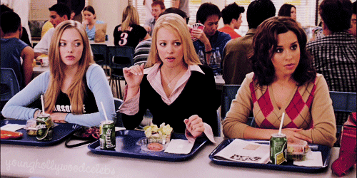 A Girl With The Number 3 On Her Shirt Sits At A Table With Other Girls GIF