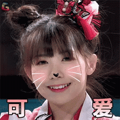 A Girl With Two Buns On Her Head And A Cat Face On Her Face GIF