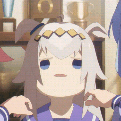 A Girl With White Hair And Blue Eyes Is Being Held By Another Girl GIF