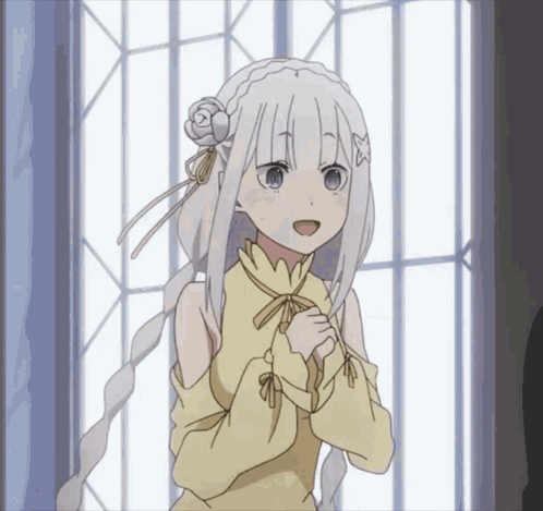 A Girl With White Hair And Blue Eyes Is Standing In Front Of A Window With Her Hands Folded GIF
