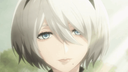 A Girl With White Hair And Blue Eyes Looks At The Camera GIF