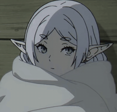 A Girl With White Hair And Elf Ears Is Wrapped In A White Blanket GIF