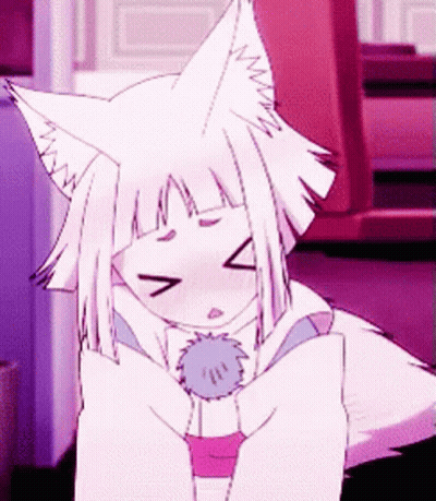 A Girl With White Hair And Fox Ears Is Making A Funny Face GIF