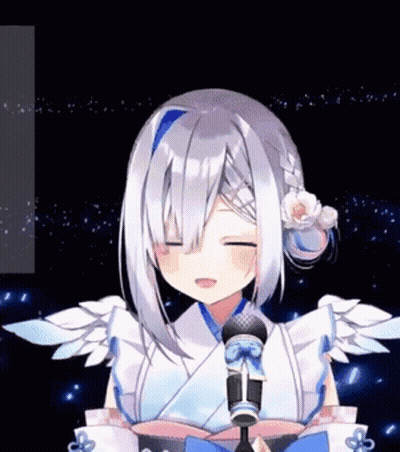 A Girl With White Hair And Wings Is Holding A Microphone . GIF