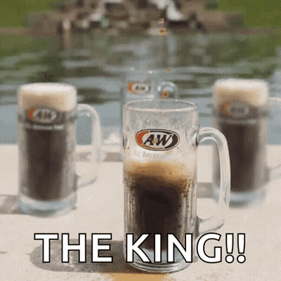 A Glass Of A&w Beer With The Words The King Written Below It GIF