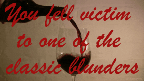 A Glass Of Red Wine With The Words " You Fell Victim To One Of The Classic Blunders " GIF