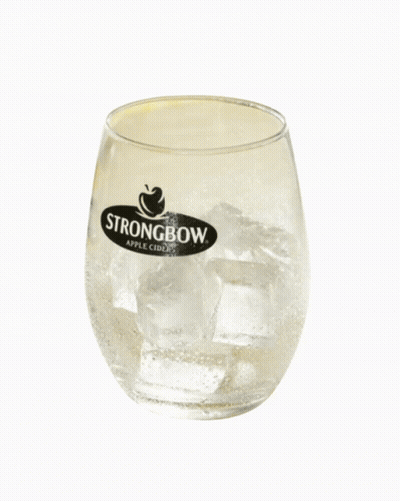 A Glass Of Strongbow Apple Cider With Ice And Bubbles GIF