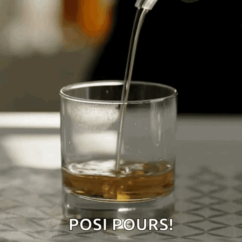 A Glass Of Whiskey Is Being Poured Into A Glass With The Words Posi Pours Below It GIF