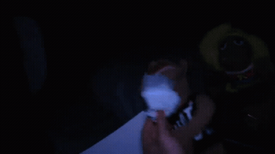 A Glass Sitting On The Floor With A Blue Background GIF