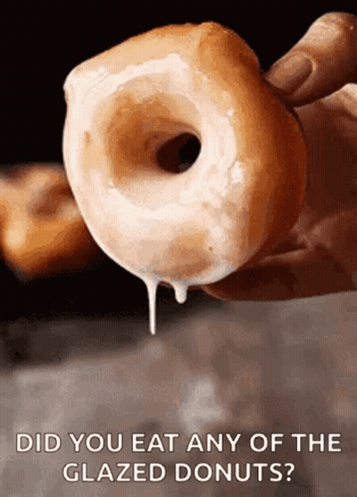 A Glazed Donut Is Being Held In Someone 'S Hand With The Caption Did You Eat Any Of The Glazed Donuts GIF