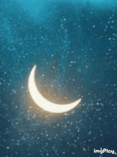 A Glowing Crescent Moon In A Starry Sky GIF