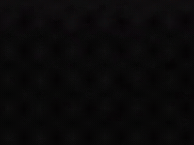 A Glowing Red Symbol On A Dark Background GIF