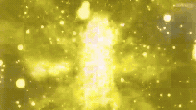 A Glowing Yellow Light Is Coming Out Of A Dark Background GIF