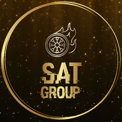 A Gold Logo For The Sat Group With A Wheel In The Center GIF