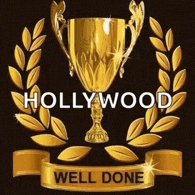 A Gold Trophy With A Laurel Wreath Around It And A Ribbon That Says `` Hollywood Well Done '' . GIF