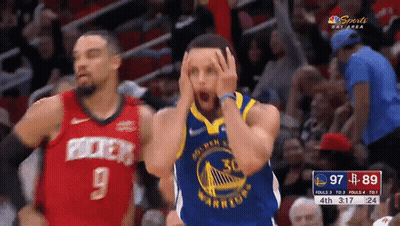 A Golden State Warriors Basketball Player Holds His Head GIF