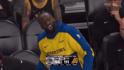 A Golden State Warriors Player Laughs In The Stands GIF