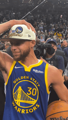A Golden State Warriors Player Wearing A Hat GIF