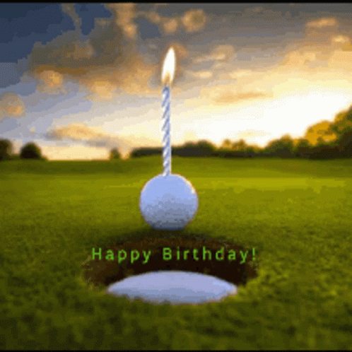 A Golf Ball With A Lit Candle On Top Of It And The Words Happy Birthday Written Below It GIF